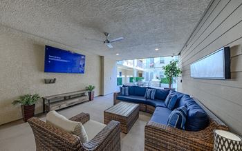 Two covered lounges: adjacent to atrium with large screen tv.